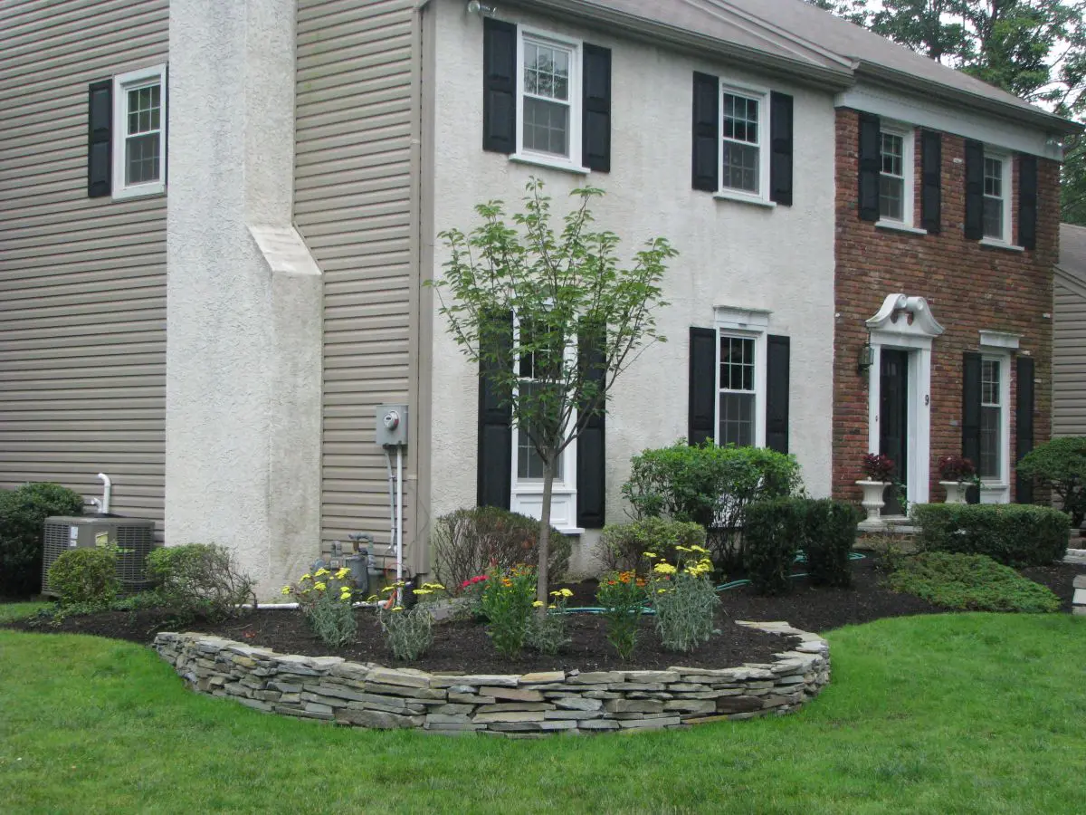 Snow Fountain Cherry With Natural Stone Wall